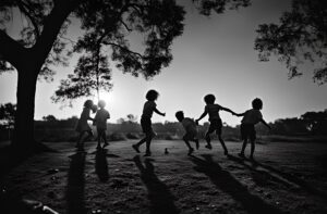 Kids playing at twilight